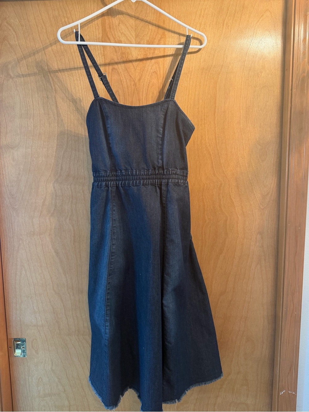 Woman’s denim dress with pockets